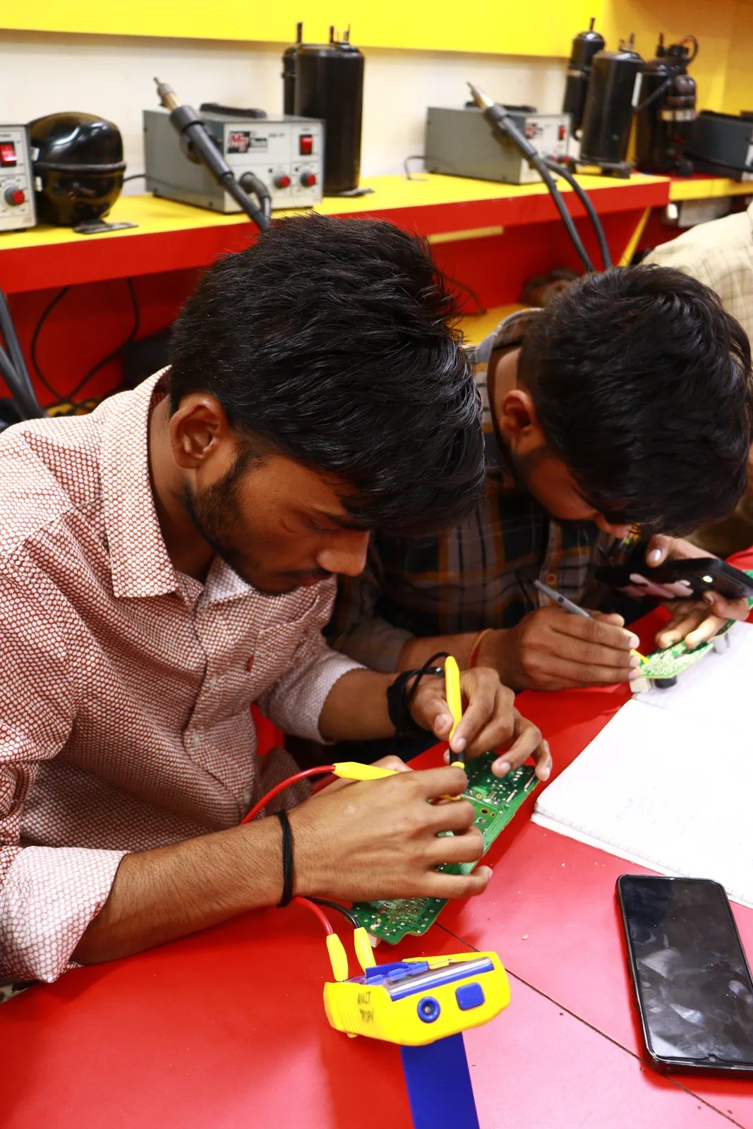 Technical professional working with electronic equipment